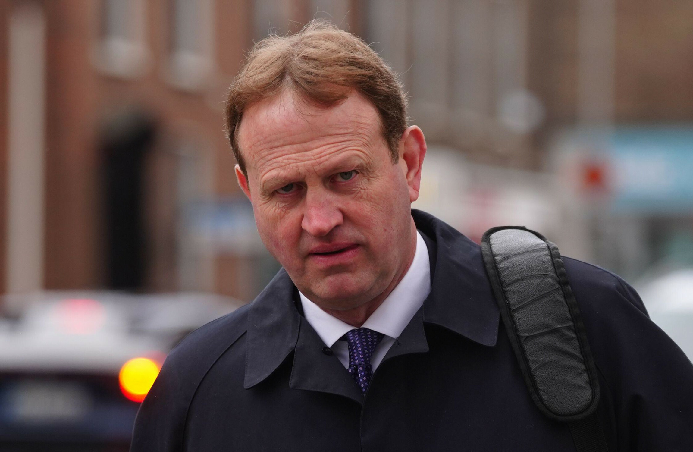 Justice minister rejects 'Trumpian' label amid legal-aid row