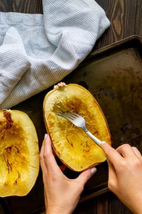 scraping spaghetti squash strands