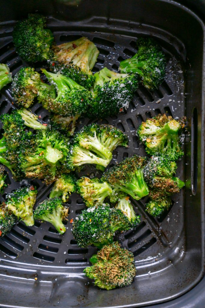 broccoli in an air fryer basket