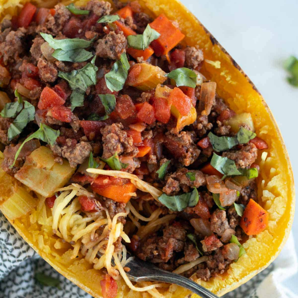 bolognese in a spaghetti squash boat