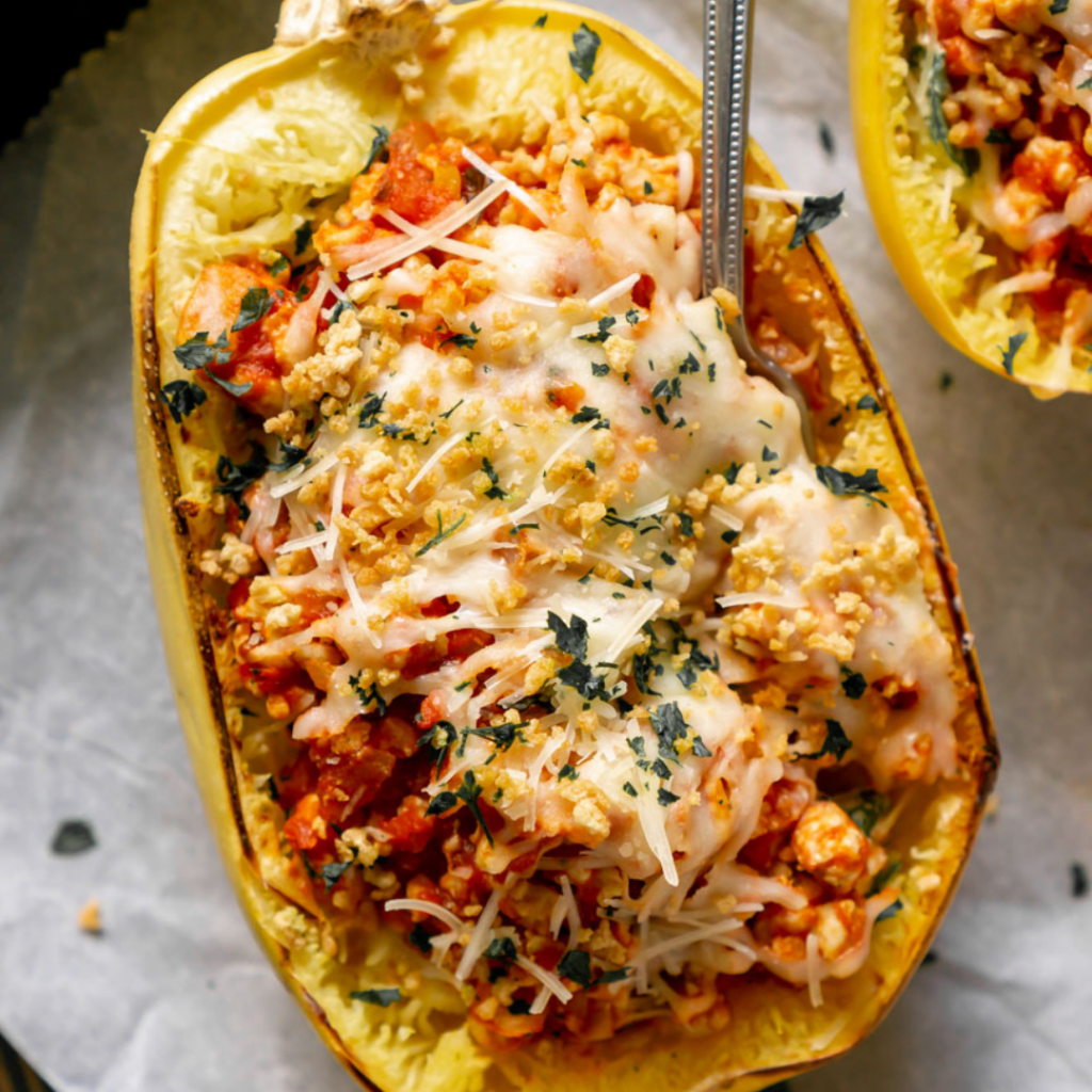 spaghetti squash lasagna boat with a fork