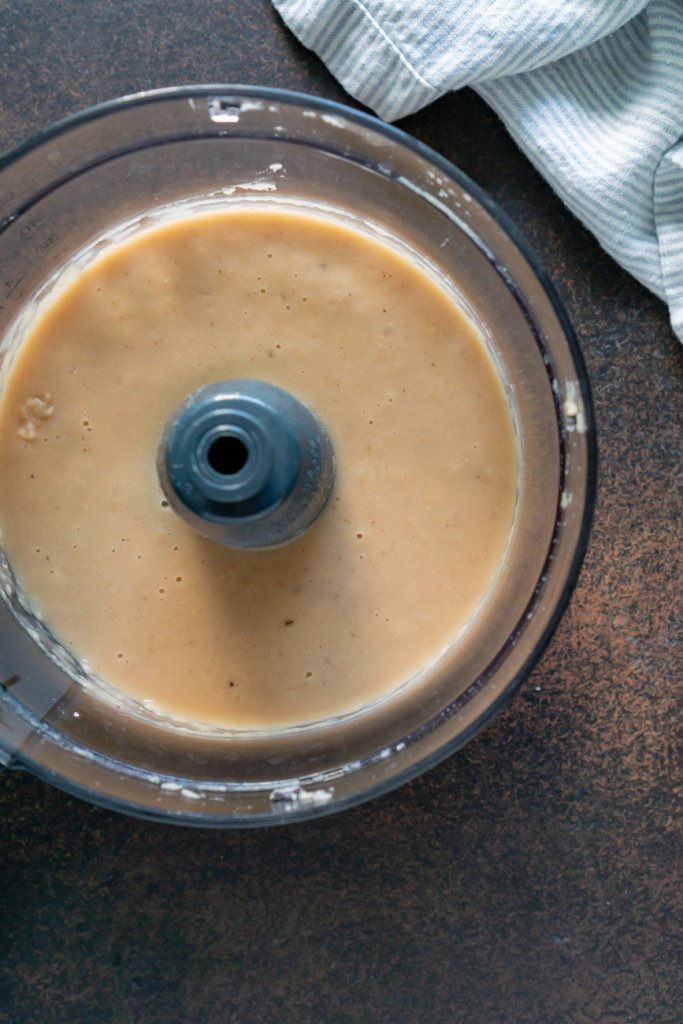 puréed cannellini beans in a food processor