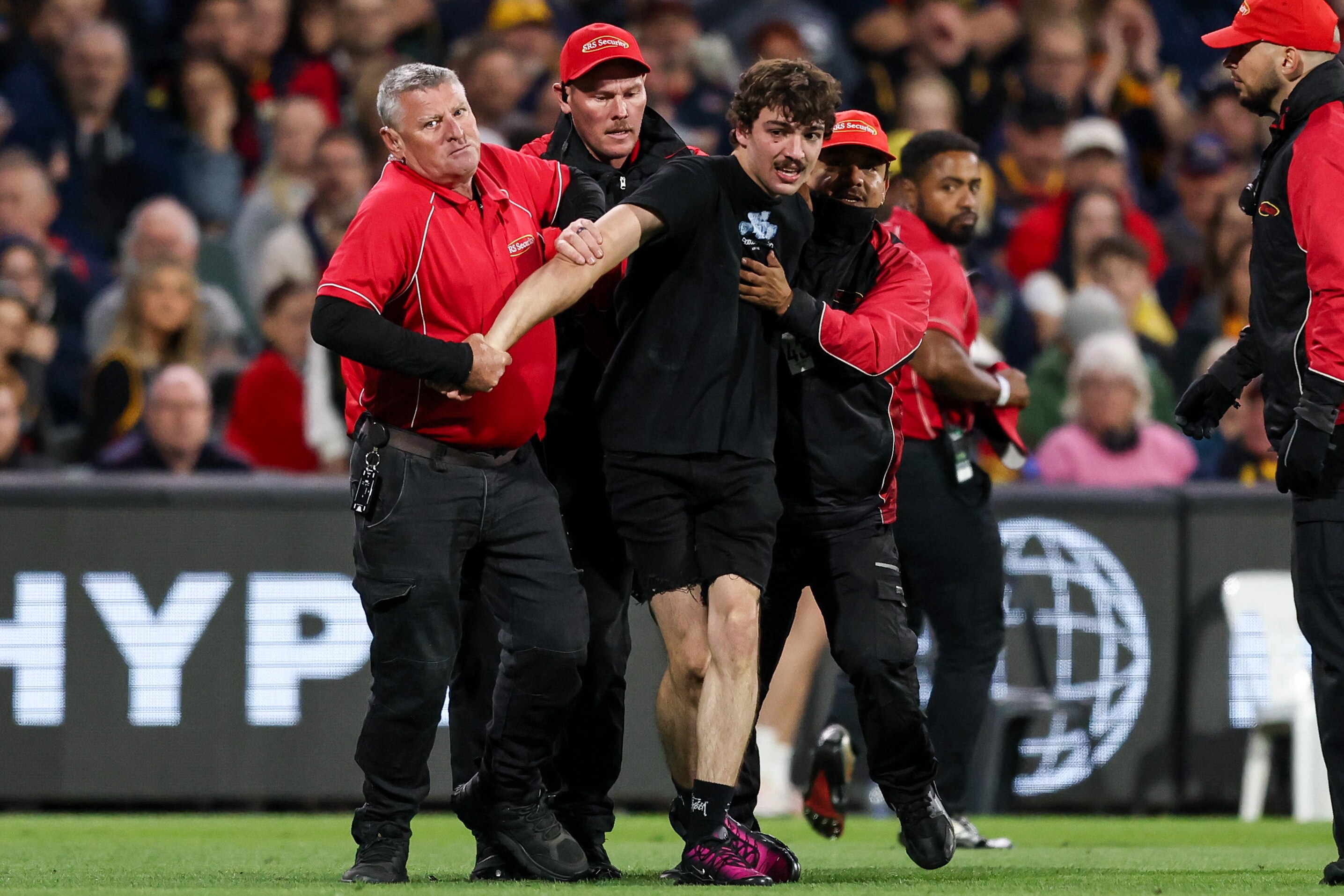 Adelaide Oval pitch invader banned from AFL and AFLW games for life
