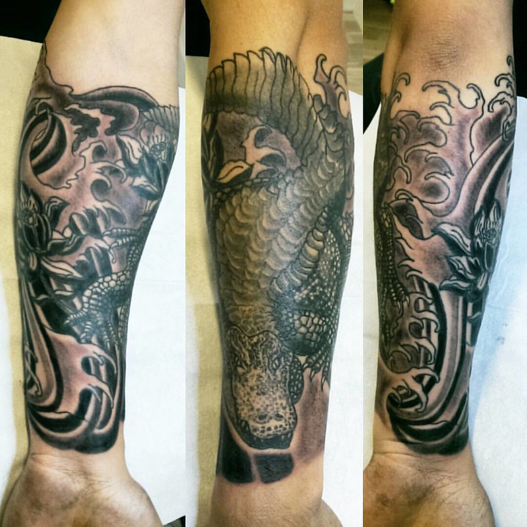 Japanese Crocodile Waves Wind An Lotus Half Sleeve,Done At… | Flickr 1024_x_1024_jpg