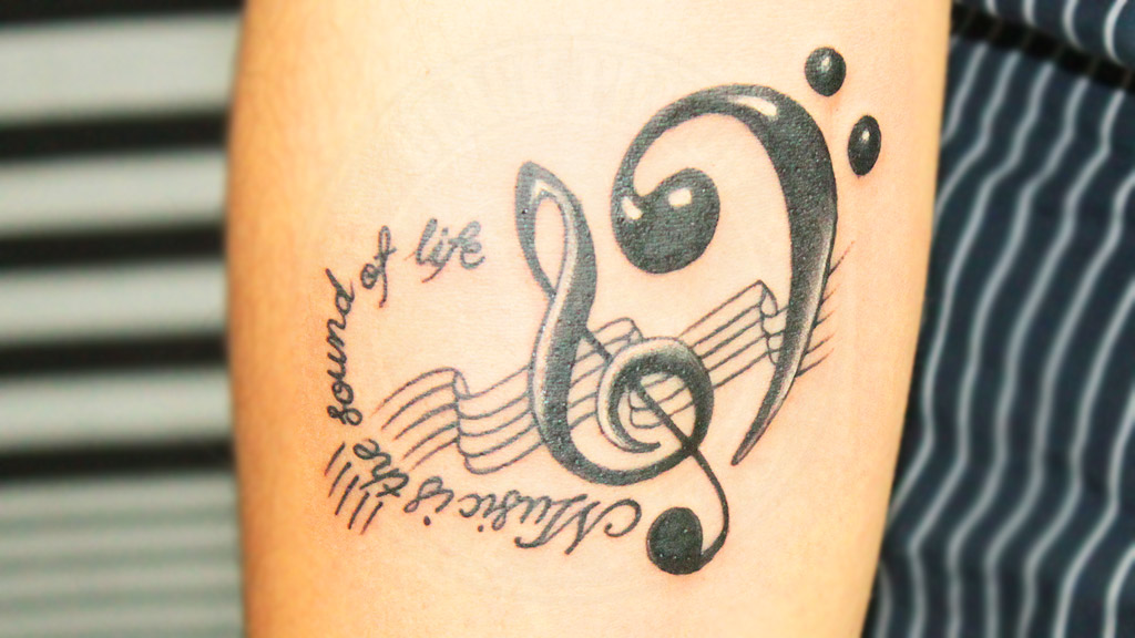 Cool Music Tattoo Design | In This World, Everyone Love Musi… | Flickr 576_x_1024_jpg