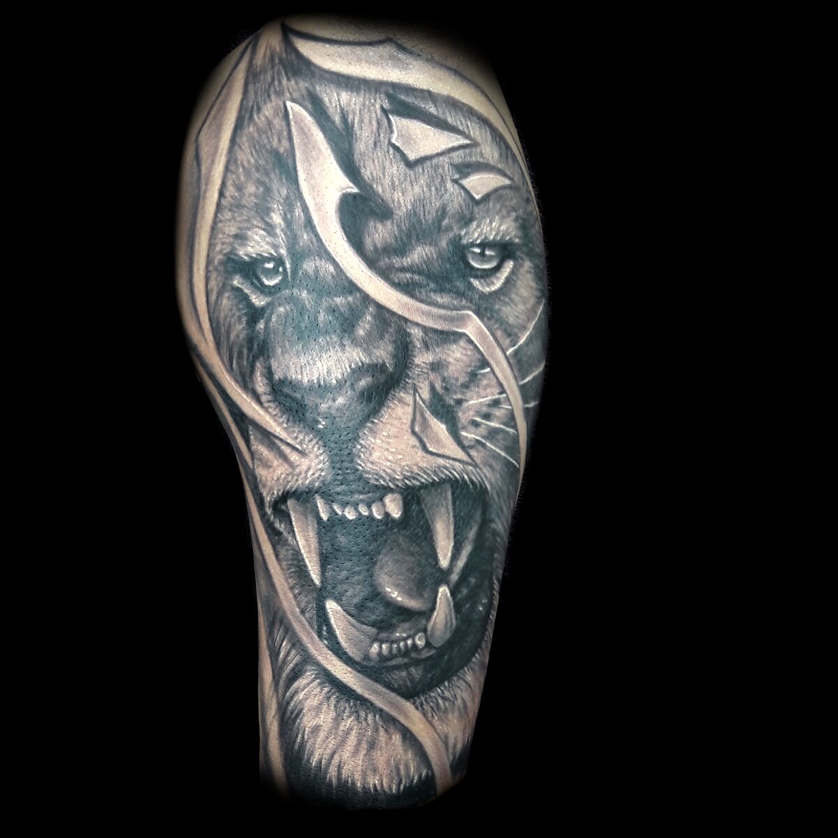 Realistic Lion Tattoo Done At Masterpiece Tattoo By Brian Martinez 1200_x_1200_jpg