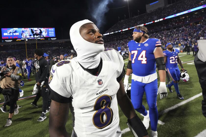 QB Lamar Jackson says he regrets shoving a fan during Ravens' crazy loss to the Bills