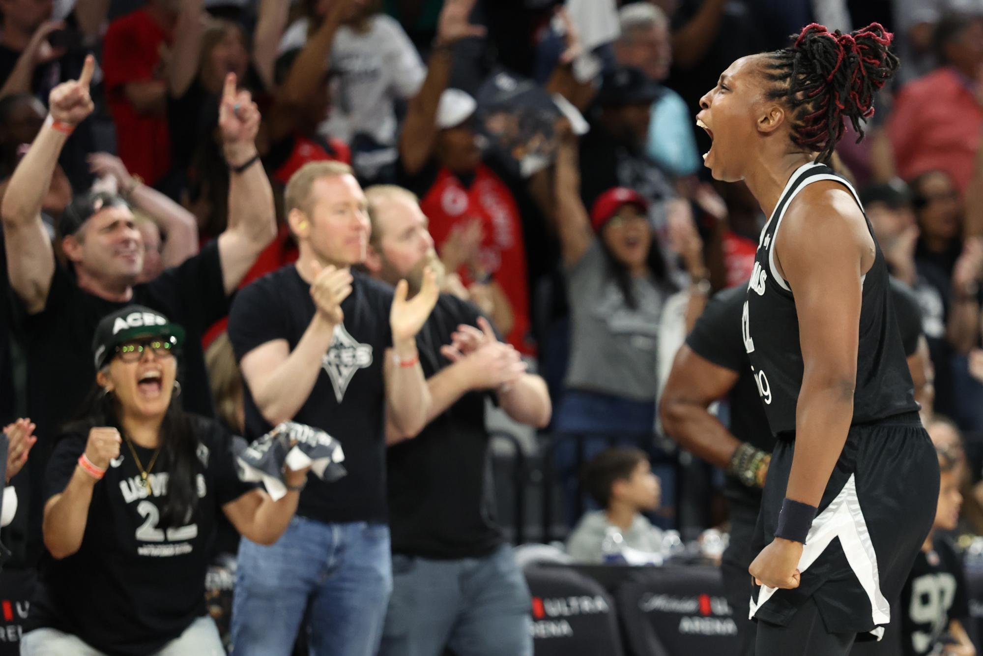 Unyielding Aces rally late to edge Mercury in WNBA finals opener