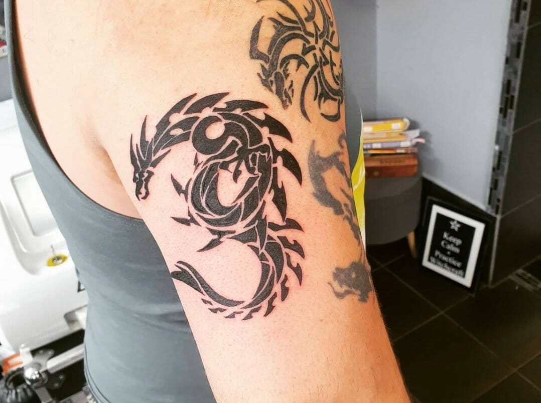 10 Best Tribal Dragon Tattoo Ideas You Have To See To Believe! | Outsons | Men's Fashion Tips And Style Guides 804_x_1078_jpg