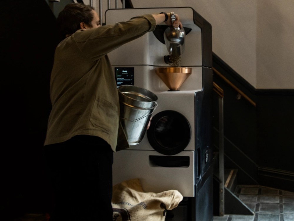 - Healthy Brew Hub Hagen loading Bellwether Shop Roaster.
