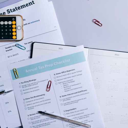 a documents and mobile phone on the table