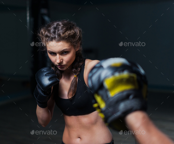 Young Fighter Boxer Fit Girl Wearing Boxing Gloves In Training Stock Photo By Igor Kardasov