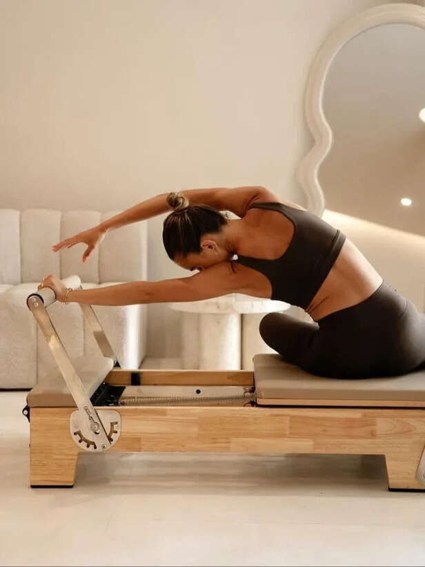 Swivel, stretch, repeat! Employees are turning their everyday chairs into full-on Pilates equipment Swivel, stretch, repeat! Employees are turning their everyday chairs into full-on Pilates equipment