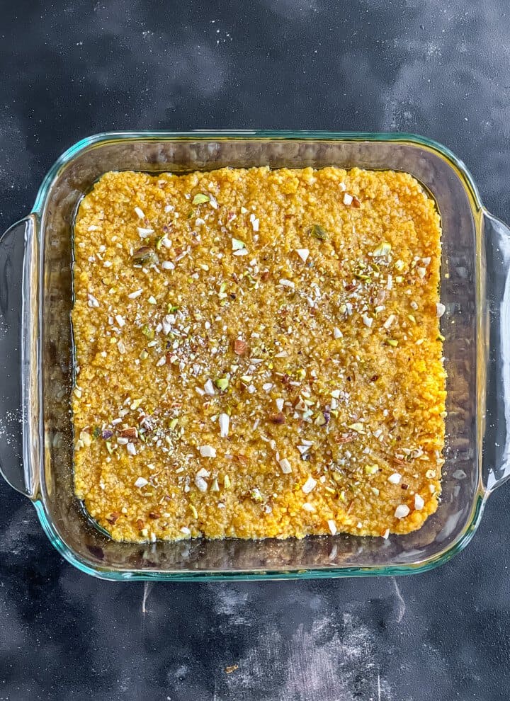 Mango kalakand in a glass pan