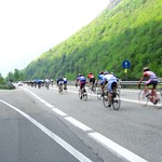 Huuuuuge pack of riders racing down Simplon Pass, Italy