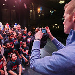 Mr. Ice, Vice Principal of Lincoln Performing Arts School takes a picture of his students on the Thomson Smillie Stage.