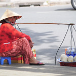 Street vendor selling coconuts in Saigon