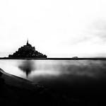 minimalist fine art B&W of the iconic island abbey and fortress at dawn. Mont Saint Michel, Avranches, Manche, Normandie, France