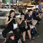 A group of Chinese tourists tuck in at the Banzaan Night Market