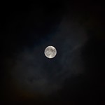 Full Moon dancing in the clouds