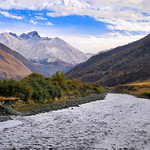 The Snostskali river flowing beneath the watchful gaze of North Chaukhi