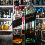 Johnnie Walker at bar Tilt