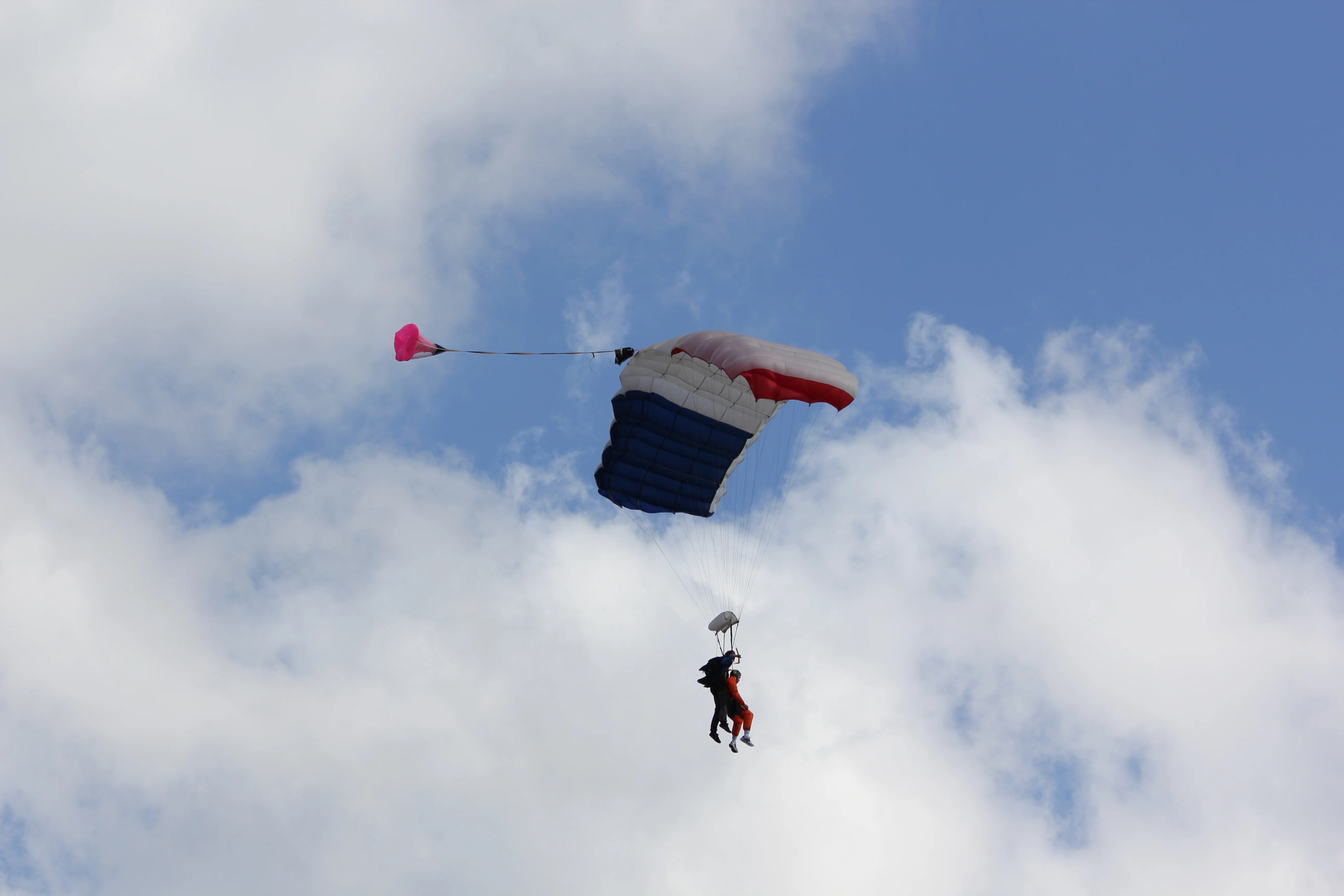 Vegas skydiving instructor and student went into spiral after parachute malfunctioned and suffered critical injuries