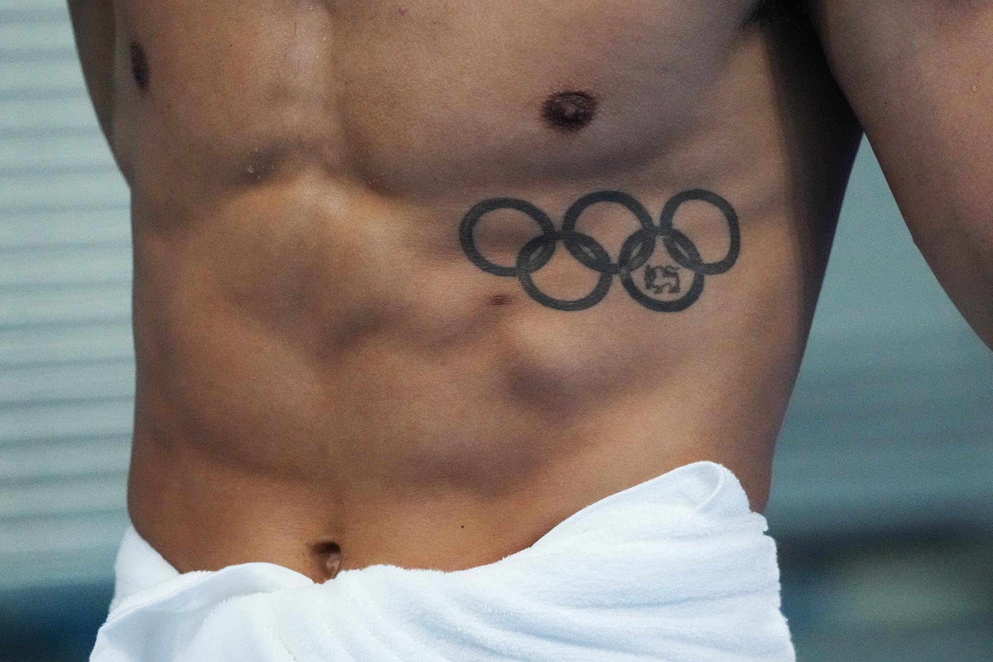Ap Photos: Taboo In Tokyo, Tattoos On Display At Olympics | Ap News 1334_x_2000_jpg