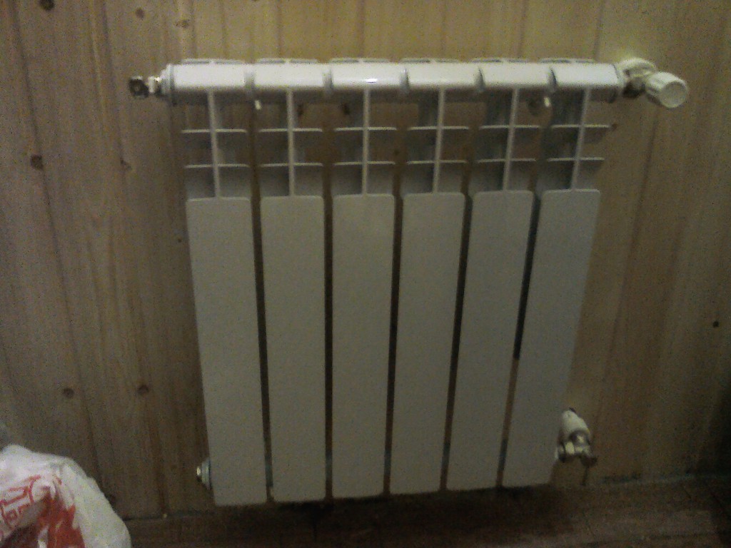 Как правильно установить радиатор отопления на вагонку