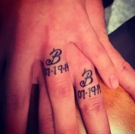 9 Wedding Ring Tattoos Ideas & Designs For Men And Women 461_x_466_webp