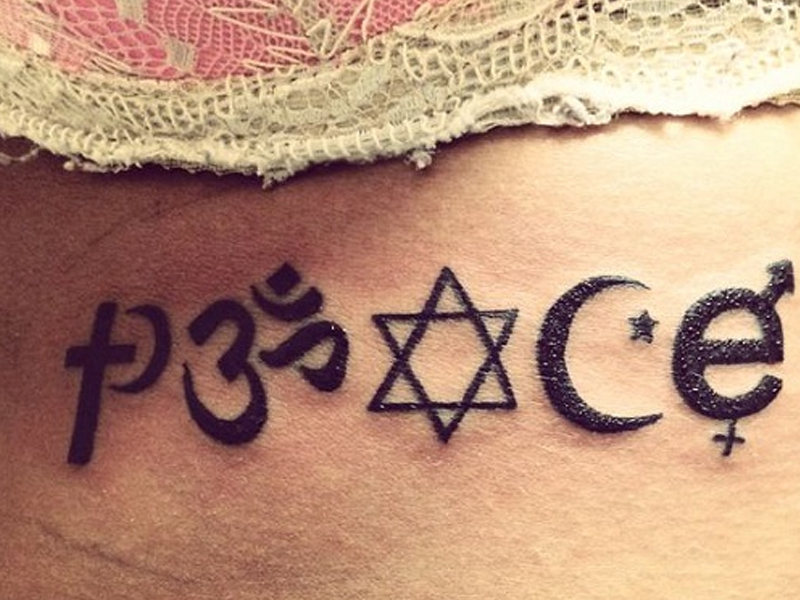 15 Best Peace Tattoo Designs To Enhance Your Beauty 600_x_800_jpg