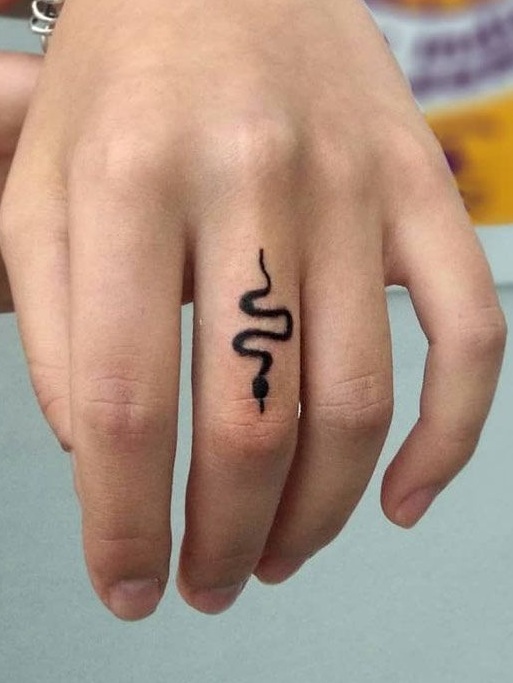 What Does A Snake Tattoo Symbolize? 683_x_513_jpg