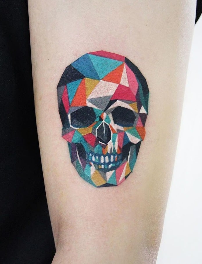 Skull Tattoo Meanings: Everyone Faces It 909_x_695_jpg