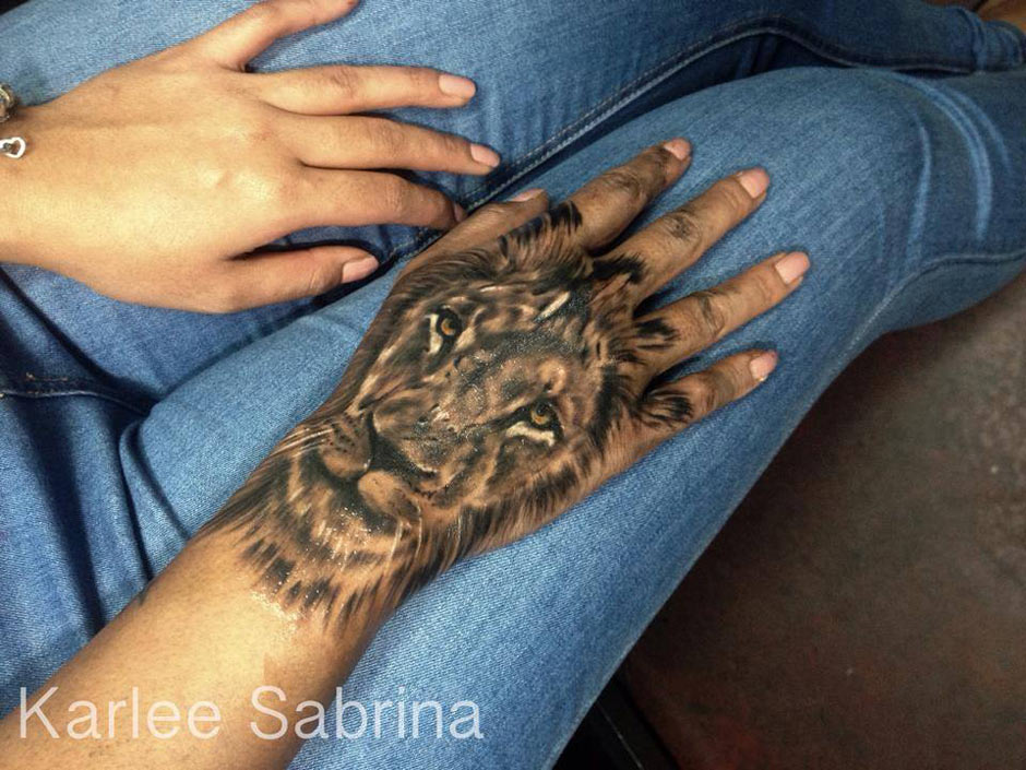 Stunning Lion Hand Tattoo 705_x_940_jpg