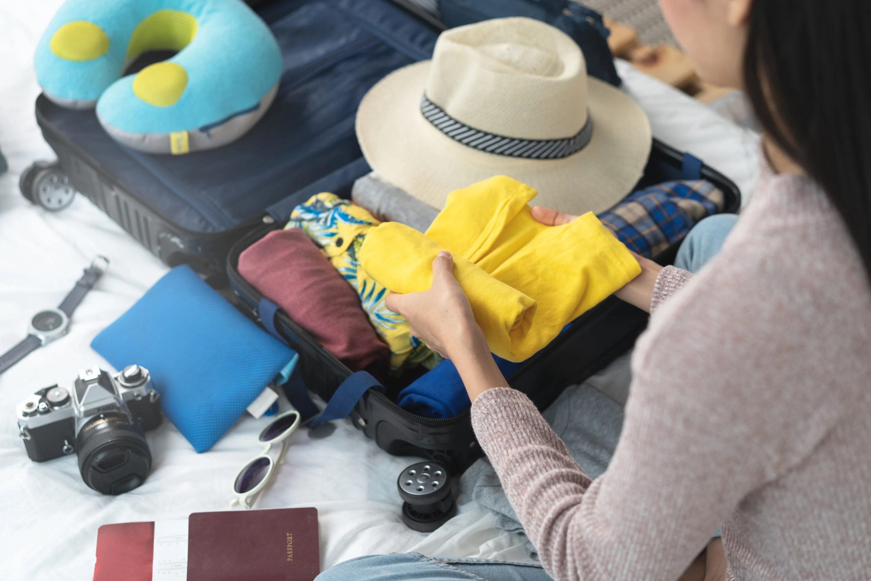 Tip 3: Roll Clothes Instead of Folding Tip 3: Roll Clothes Instead of Folding