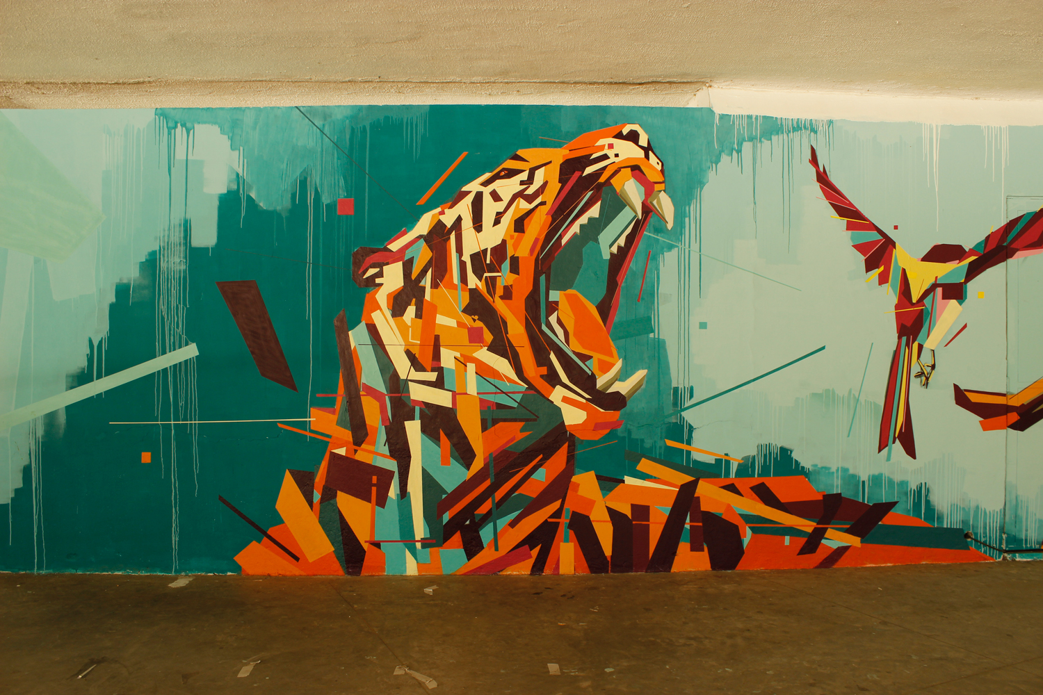 Rainbow Animals Roar Across Geometric Street Art Murals