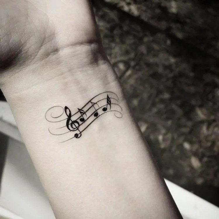 Tattoo Notes: Meaning, 30 Photos And The Best Sketches On The Arm 750_x_750_jpg