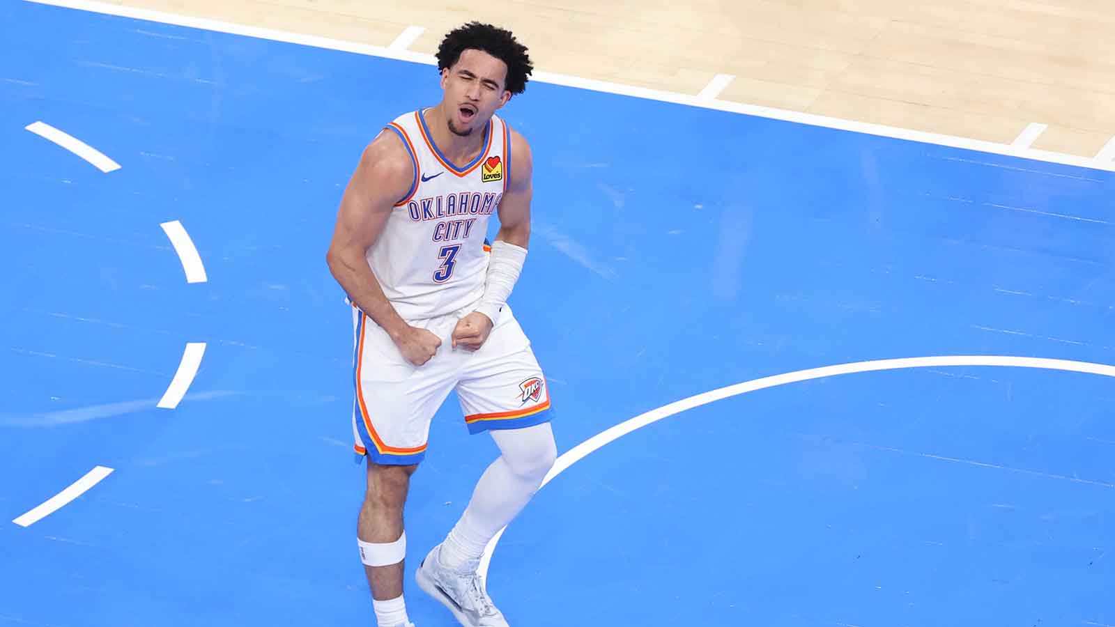 Thunder guard Jared McCain (3) reacts after a basket during the fourth quarter against the San Antonio Spurs in game five of the western conference finals for the 2026 NBA playoffs at Paycom Center