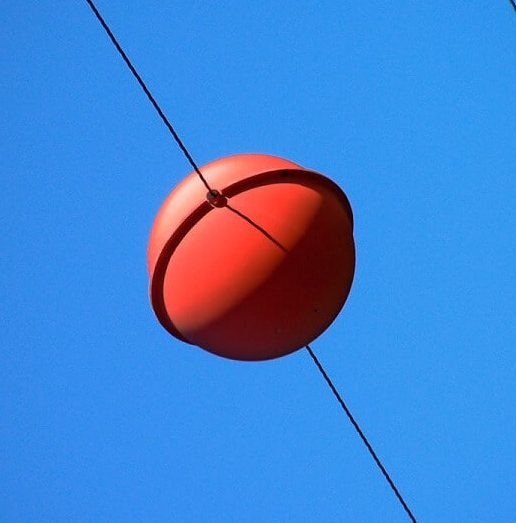Top 32+ Photos why are there red balls on power lines Stunning