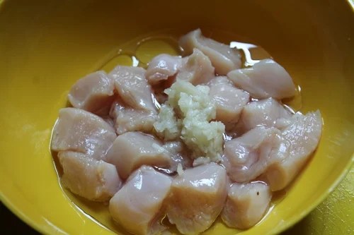 add grated garlic over the chicken