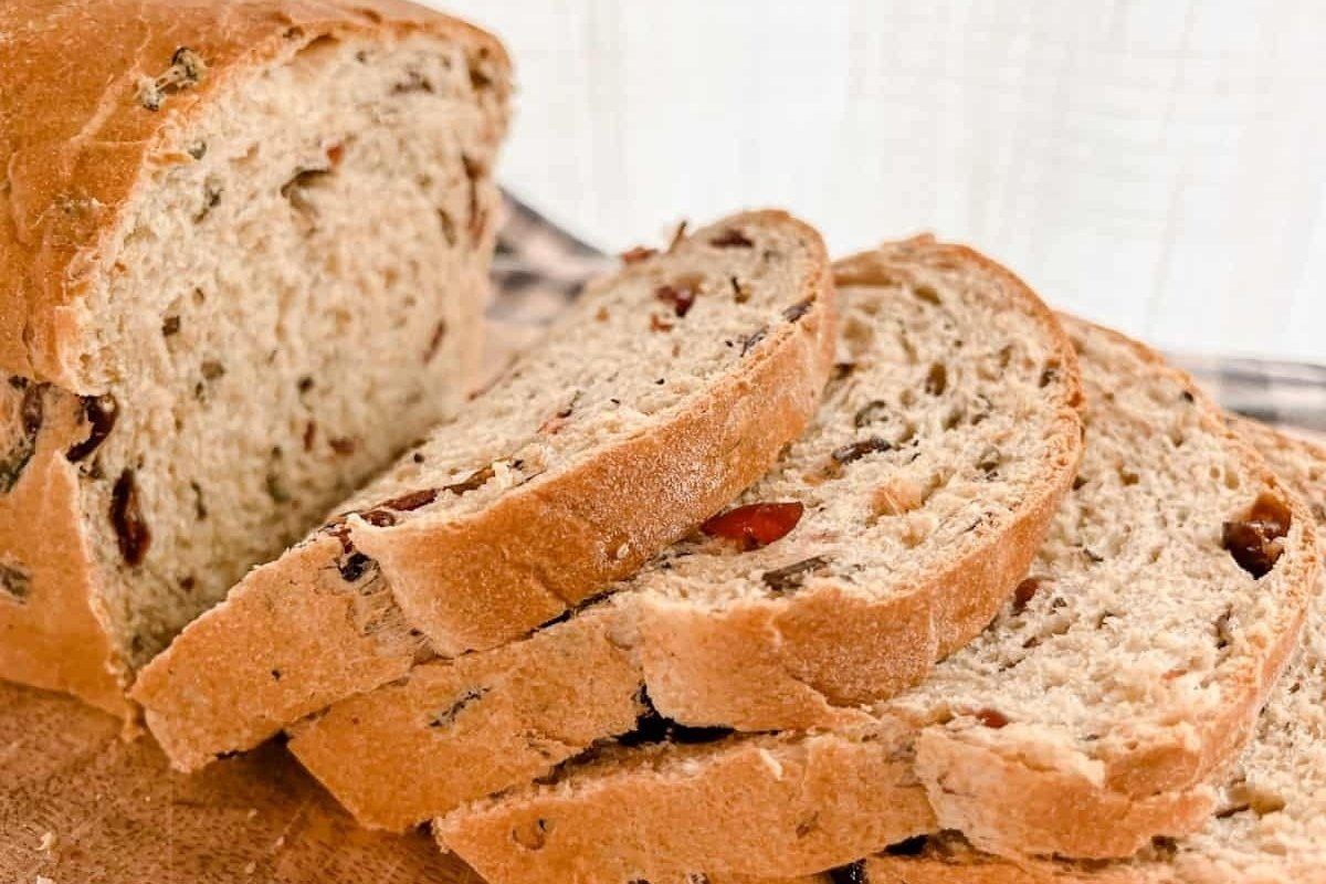 A loaf of bread with raisins and walnuts from our bread recipes.