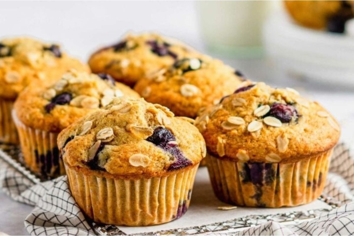 A batch of muffins packed with blueberries and oats, perfect for a delicious breakfast or snack!